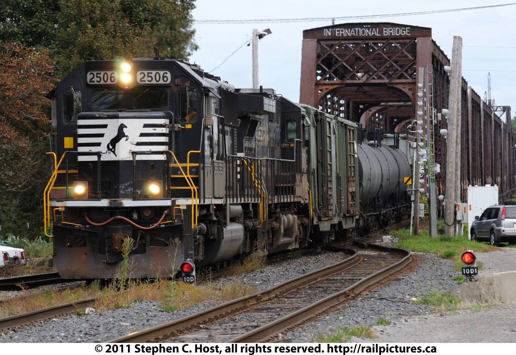 NS 2506 leads Train symbolled H3R (Formerly NS 369 or 445) across the International Bridge into Fort Erie, Ontario, Canada with interchange traffic for Canadian National. This train uses Canadian St. Thomas based crew, the very same that used to haul NS and Norfolk and Western traffic through Ontario and hold this interchange job due to their Union contract dating to the Wabash Railroad.