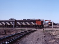 CN 532 crosses the CP diamond at Emerson, Manitoba as a CP awaits it's turn
