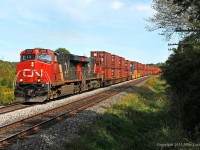 CN 2285 and 2273 lead 149's train through Newtonville. 1358hrs.