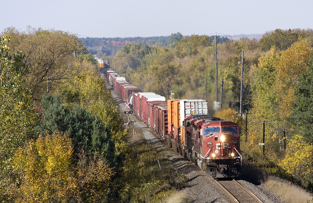 he sign of fall foliage can be seen as a pair of mac\'s break the silence of the country side, as 9151 leads CP 220