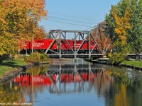 CP 3114, 3038, and 3043 cross the Trent Canal on their way to Havelock. 1325hrs.