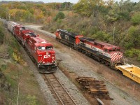 After exchanging blasts of the horn, CP 626 and CN 331 go their seperate ways on a chilly fall afternoon