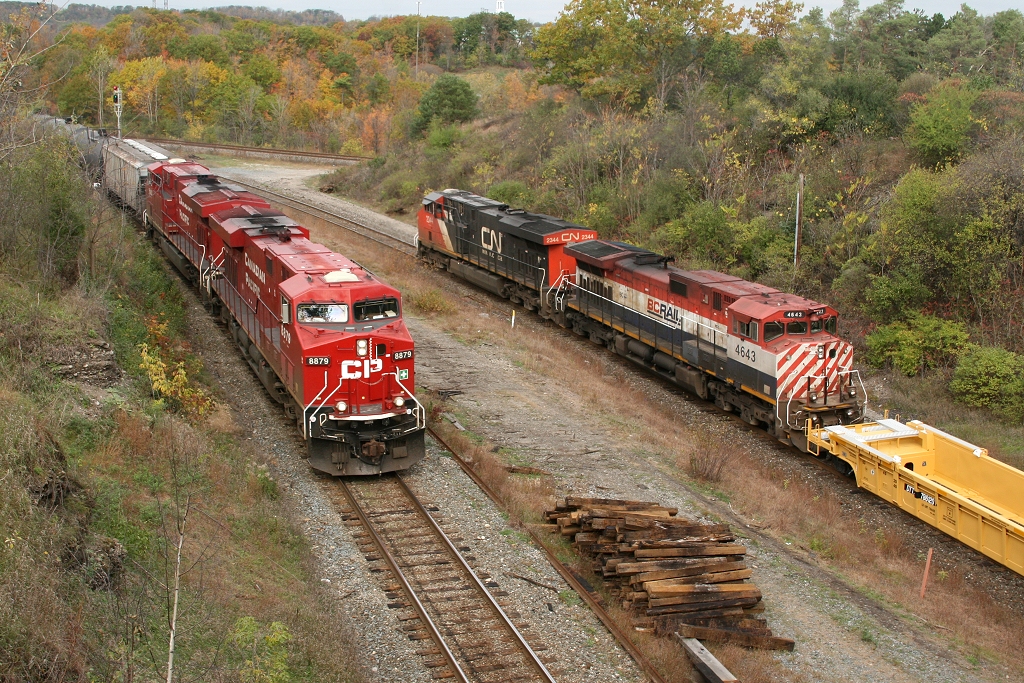After exchanging blasts of the horn, CP 626 and CN 331 go their seperate ways on a chilly fall afternoon