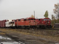 CP BAL-13\'s power heading to the South end of the yard seen beside CP 9117 North (221) in track 1 waiting for 112 to arrive during a busy moment at MacTier. 