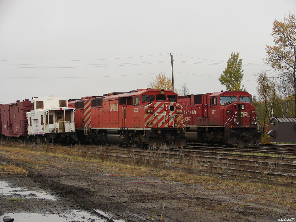 CP BAL-13\'s power heading to the South end of the yard seen beside CP 9117 North (221) in track 1 waiting for 112 to arrive during a busy moment at MacTier.