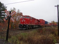 CP 8918 South with 112\'s freight holding off at Stewart Lake road just outside of MacTier as the Toronto crew gets their paperwork together before calling their train down to the station.