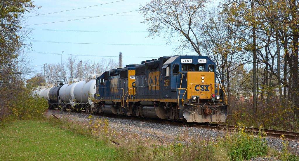 The Sarnia CSX local led by a pair of GP38-2\'s heads south on the CN St Clair River Industrial Spur after just exiting the CN Sarnia Yard.