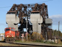 CN coal train, C773 crosses over the Jack Knife bridge as it departs the Island after Thunder Bay Terminals Ltd. dumped the 150 cars of coal. Today's power was CN 2527- CN 2582- CN 8953