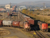 An "Extra 14" shoves a string of empties towards TC92 using CN 5504, one of the three SD60F\'s that came in on train A436. The other two sit on the \"Northern Wood Preservers lead\", they are CN 5514 and CN 5504.