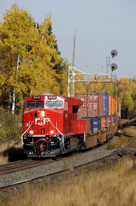 CP 113-06 crests the grade at Loon with brand new GEVO 8925 in the lead. Mid train CP 8926 does \"helper\" duty.