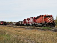 <b>Rare appearances, in unusal places.</b> In the small "north yard" at Ignace, Ontario, a rare scene takes place. Fresh in from the Dyment Pit, the "rock train" numbered 9965-09 sits in track six with SOO SD60's 6046 + 6043 with CP 6024 while down in track 2 SOO SD60 6045 sits solo with an apparent b/o trainline or hosebag. It will be lifted on the nights Paper train. Too make this scene all the more rare, these SOO SD60's will be heading to the paint shop to take the old SOO colours off once and for all and replace it with Canadian Pacific, with this change the numbers will change as well and become CP 6200s.