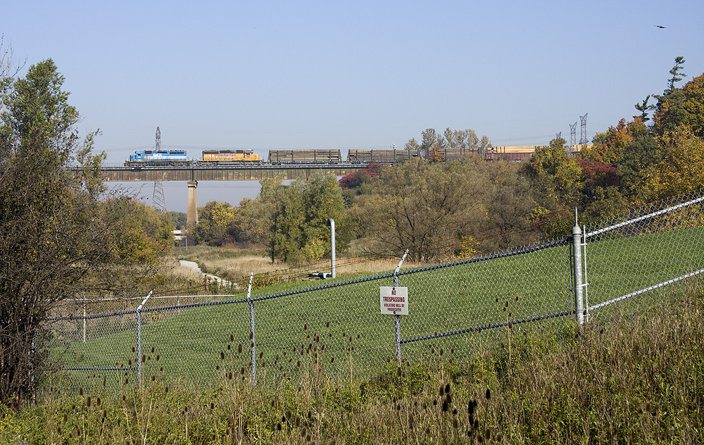 Fall foliage colorrs in the GTA and surrounding the area come alive, as GEXR 431 finally heads west after being tied down for the night in mac yard.