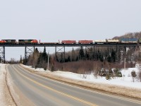 CN L57231 06 - CN 6012S (The Algoma Central SB manifest from Hearst to Sault Ste Marie) heads across the Bellevue Trestle a few miles north of the Lock City.