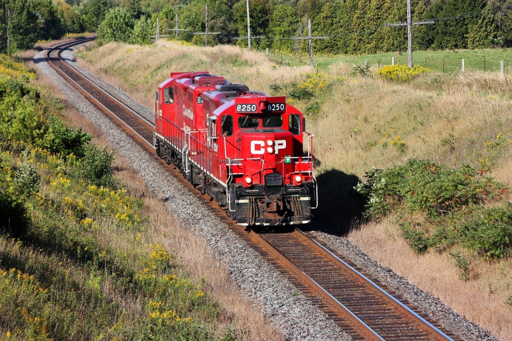 CP 8250 and CP 8251 head east at the Twin Bridges on CP\'s Belleville Subdivision on a beautiful Saturday September morning.
