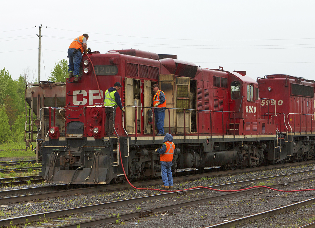 After being unsuccessful with attempts to fill up 8200 with water at CN Waubamik, Toronto and Mactier crews work to quench 8200\'s thirst at SNS Mactier.