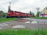 3114 is seen reflecting in the puddles in Claremont in what was a very rainy May.Along with the usual power 3133,3045 8200 is on its way to Peterborough to serve as a switcher.