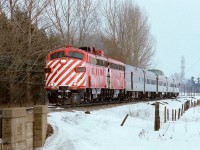 CP Rail train #11, the Toronto section of 'The Canadian' at track speed approaching Kleinburg, March 1978. Consist and power typical for the 'off season'. Within weeks of this negative exposure Train #11 will be 'Via'ized'. For the time being, enjoy. Kodak Kodacolor II negative film, transported by a Nikon Nikkormat EL.