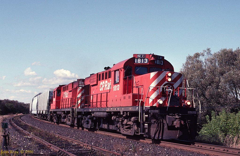 Two RS-18s eastbound through Lovekin siding on the Belleville sub in February 1992