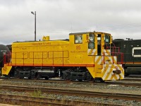 Fresh from the NRE Shops in Capreol, Hamilton Works 85 sits on the south lift at Capreol.  594/596's power sits behind it.  Unit had come out of Nanticoke, Ont. and was in Capreol for a rebuild.