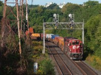 CP158-11 heads east thru the ritzy part of Toronto called Rosedale with a London built General Motors Diesel Division SD40-2 leading an Erie built AC4400, the fall colours haven't come in yet but signs of it are starting to show in some parts of the city and all around the GTA, fall railway photographing will be awesome this year. Photo taken with the Sony 70-400 F4-5.6 G SSM lens.