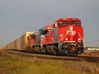 CP 147 led by new CP 8926, CEFX 1014 & SOO 6059 hooked elephant style, heads westbound towards Windsor with this autorack train as it passes the Jeannette setoff siding at mp 76.
