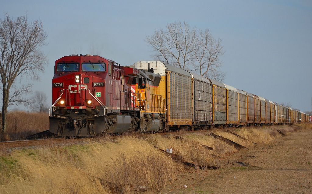 CP 249 led by a CP AC4400CW and a CITX SD40M-2 (ex UP) heads westbound from Belle River on its way towards Windsor.