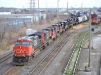 CN 385 in Sarnia Yard getting ready to depart towards Port Huron after picking up the 4 NS SD70ACes that CN 509 brought earlier in the morning.