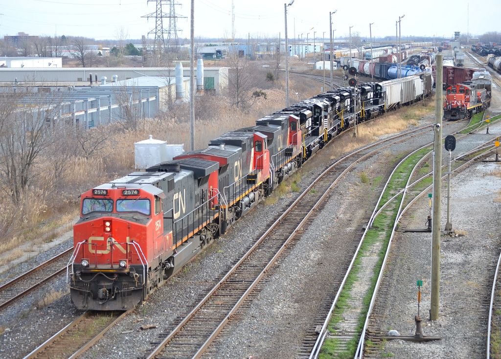 CN 385 in Sarnia Yard getting ready to depart towards Port Huron after picking up the 4 NS SD70ACes that CN 509 brought earlier in the morning.