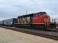 CN 5347, an SD40-2W, hauls the CN track evaluation train westbound past the Sarnia VIA station and onwards to Port Huron.