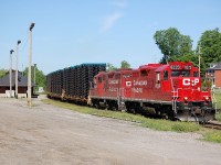 Working past the Galt station, old CP 142 (the Frame Train) slides through the curves with vehicle frames from the Magna plant in St Thomas for the GM plant in Oshawa.