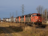 Racing the first snowfall of the year, CN A436 with a trio of SD60F's catches a glimse of sun as the crew cross town with their headend 69 cars bound for Port Arthur. Upon arrival in PA, they would yard the train on TC92 (the usual outbound track) due to no room in the yard. Earlier in the morning (under the cover of darkness), grain train G840 yarded, his power was another set of SD60F's!