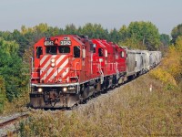 3042 leads a small train of 12 cars up the grade at Green River Ontario.