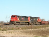 A pair of relatively new, but already grubby looking, acquisitions including 2115 in the 15th Anniversary (of the privatization of CN) paint scheme head up CN 331 on November 5, 2011.