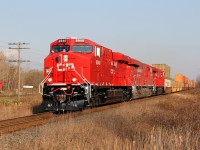 CP 115-01 speeds through mile 127 of the CP Belleville Sub adjacent to CN's Grafton plant. CP 8946 had just been delivered to CP, and ran east to Montreal prior to a run to Western Canada providing the power for one of CP's hotshot trains.