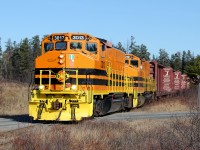 Local to Espanola backs into the Nairn Center spur with empty flatcars for the Eacom sawmill on the Spanish River