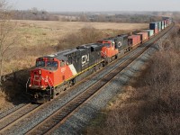 CN 2251 + CN 5800 lead a shorter than normal Q121 through Newtonville, much of the train was block swapped to 149.