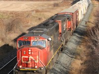 CN X37121 25 heads through Newtonville