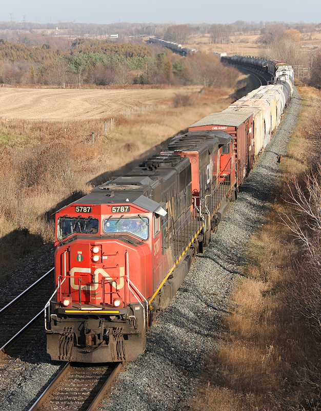 CN X37121 25 heads through Newtonville