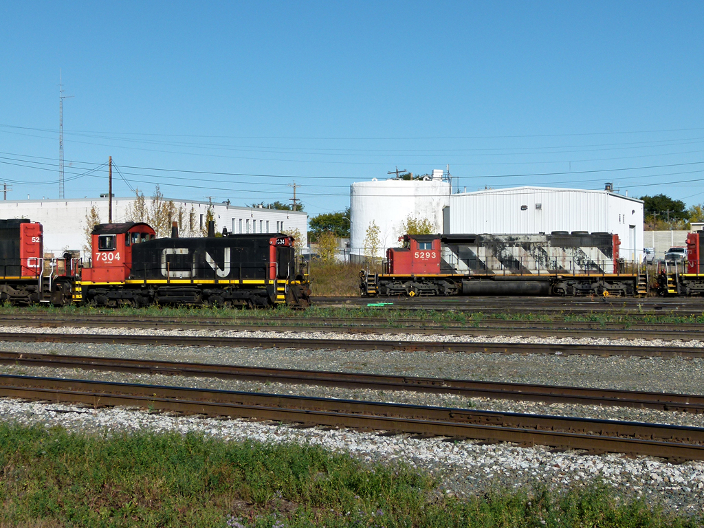 SW1200RM 7304 and SD40-2(W) 5250 parked at Walker Yard