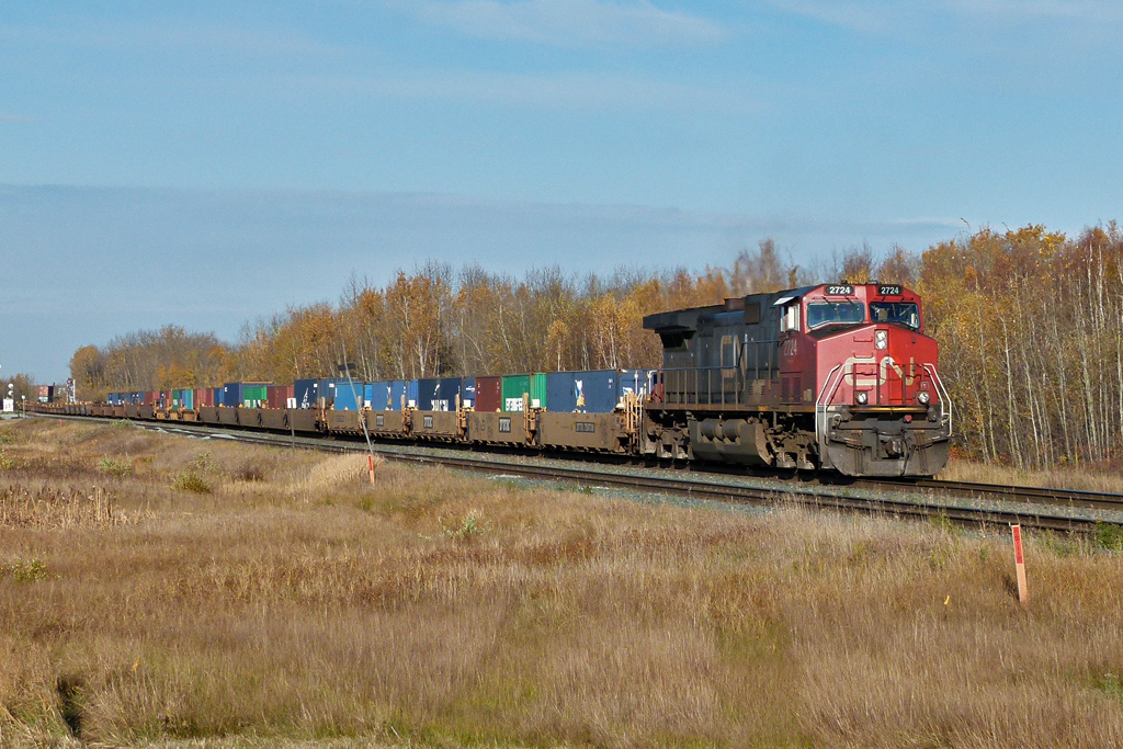 IC 2724 trails Roberts Bank bound CN 101 as it travels west through Uncas.