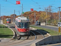 With colours still hanging on well into the beginning of November, TTC 4222, a UTDC/Lavalin product built in Thunder Bay, Ontario travels eastbound off the separate RoW along The Queensway. 