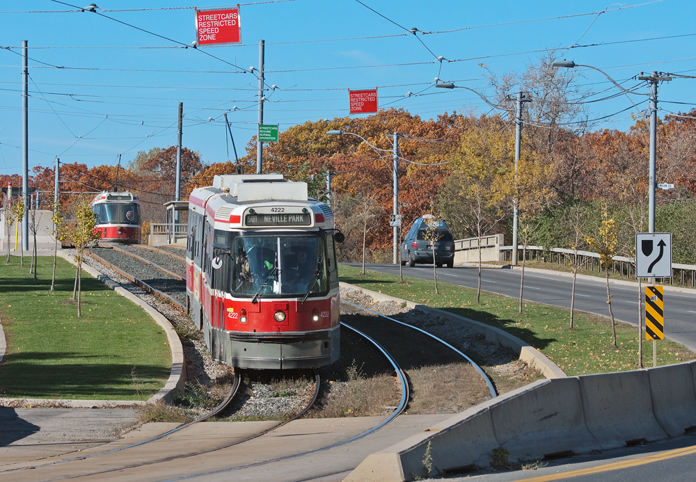 With colours still hanging on well into the beginning of November, TTC 4222, a UTDC/Lavalin product built in Thunder Bay, Ontario travels eastbound off the separate RoW along The Queensway.