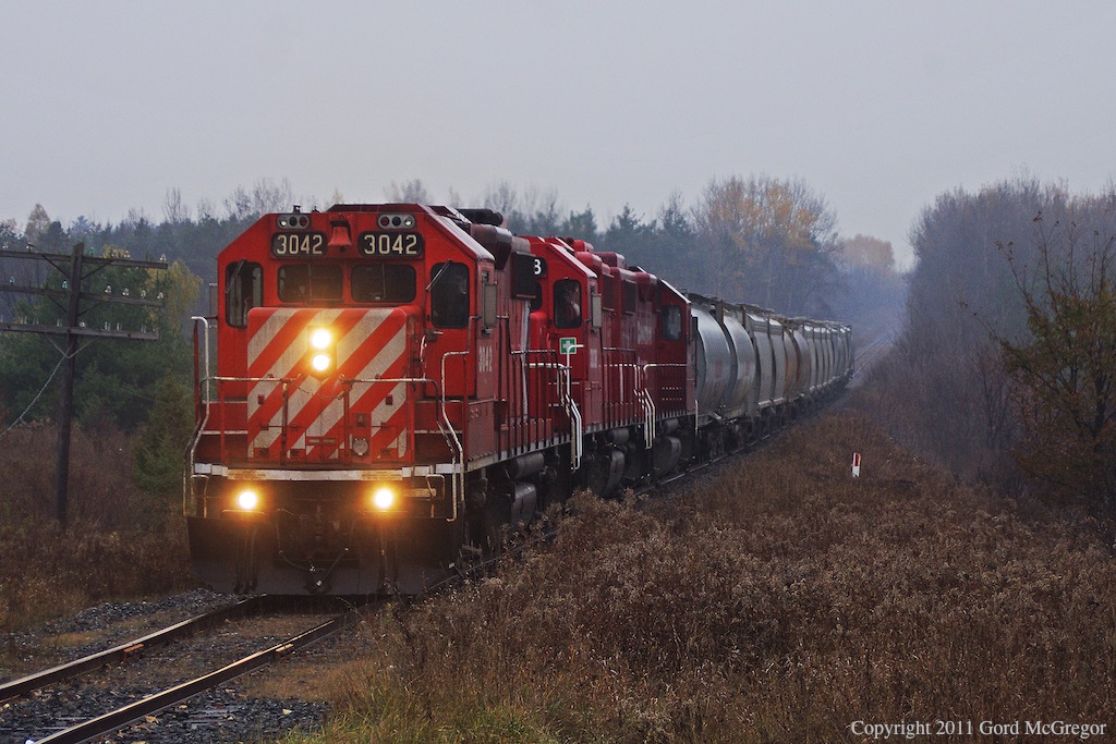 3042 is on its last trip from Havelock this year in the rain at Green River once reaching Agincourt 3111 will takes its place for the return.