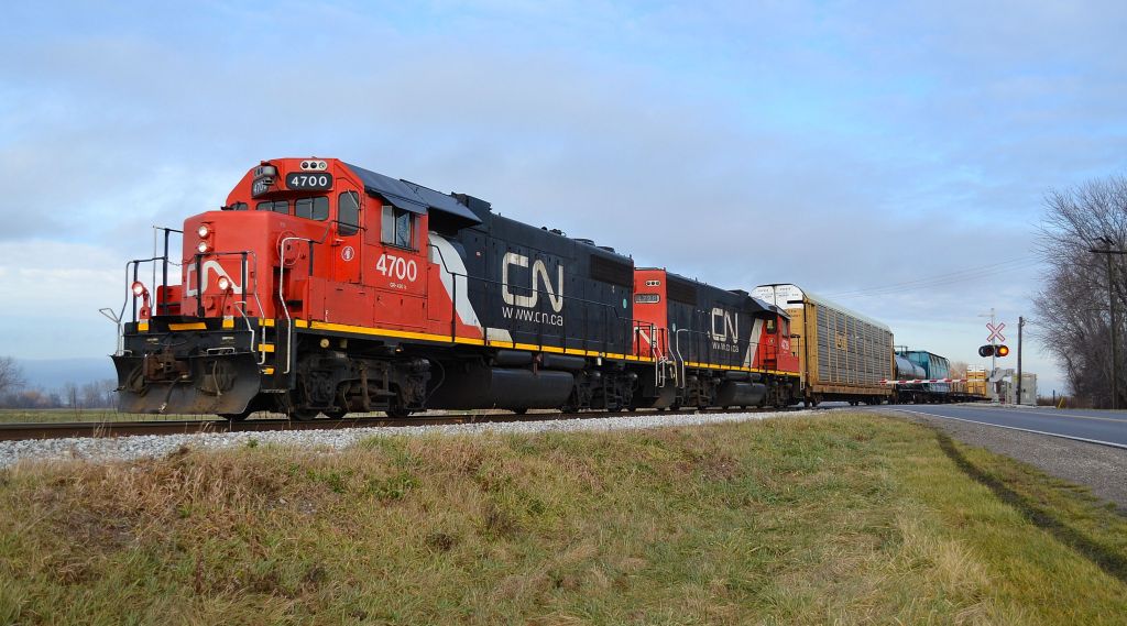CN 439, powered by a pair of GP38-2\'s, heads towards Windsor on its way back from its daily trip to London.