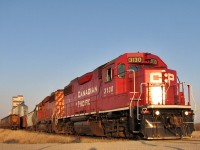 CP P34 with 3130 and 5908 back the first half of the train into the elevator tracks. 