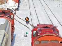 Already over an hour behind schedule and blocked by 2 yard jobs a crew member walks to the tower while the snowbound 3133 waits its turn.