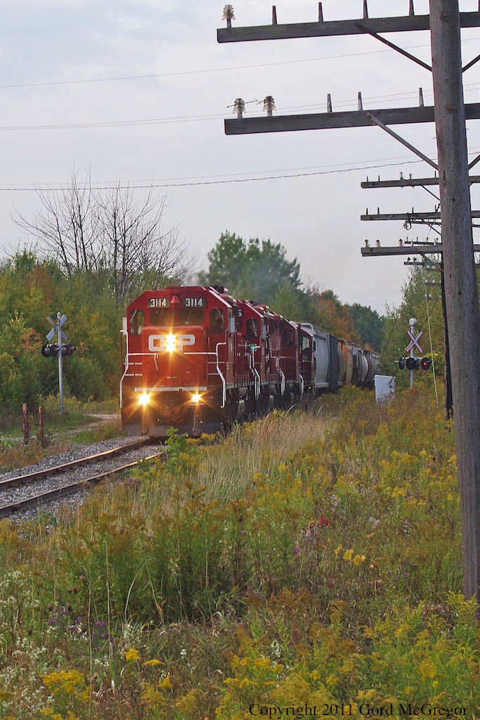 Climbing out of Duffins creek T08 is approaching a very warped section of trackage in Pickering.