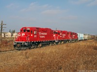 Talk about lighting up a drab November day!I had to put the sunglasses on to view this consist 3111,3038,3114 on T07 approaching Toronto.