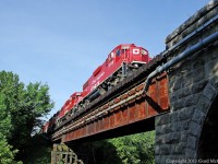 Canadian Pacific after many years cleared the trestles on the Havelock Sub this year.This one is over the Rouge River and I was very pleased to see the wonderful stone arch that had been buried in the bush for many decades.