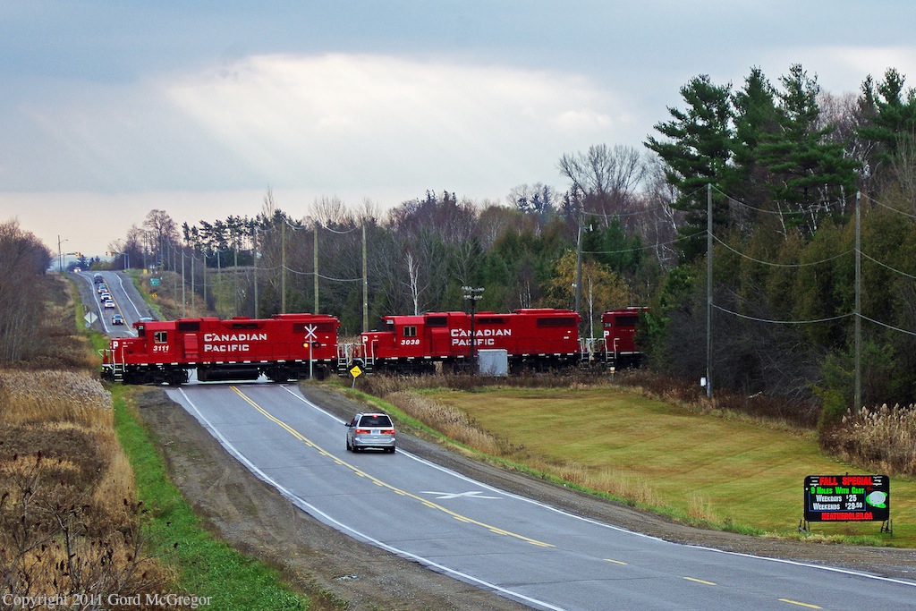 Rays of sun bleed through the November sky in Whitby,T08 rides a lower part of the Moraine south of Durham\'s Ski Counrty.